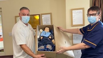 Baby doll donation for Dove Court Residents